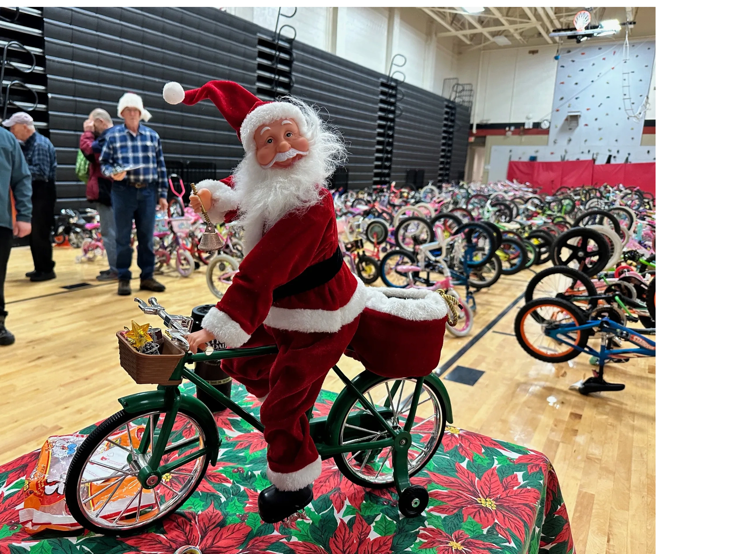 Volunteers preparing bikes for the Christmas giveaway
